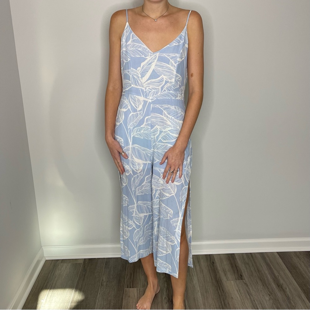 Blue + White tropical romper 💫 size medium, gently used